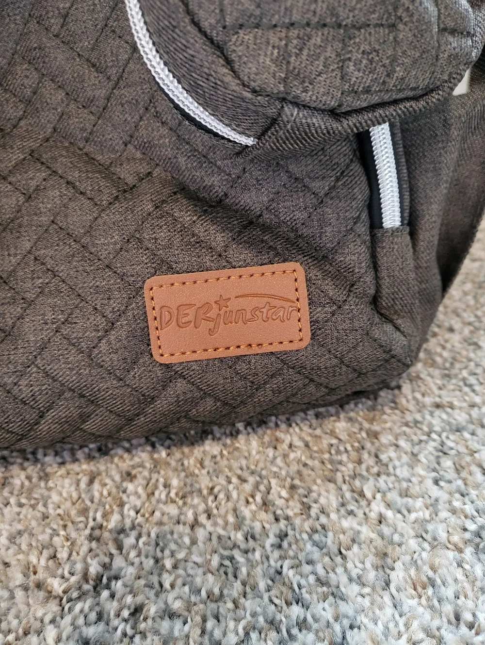 DERjunstar Diaper Bag With Collapsible Changing Table/pad